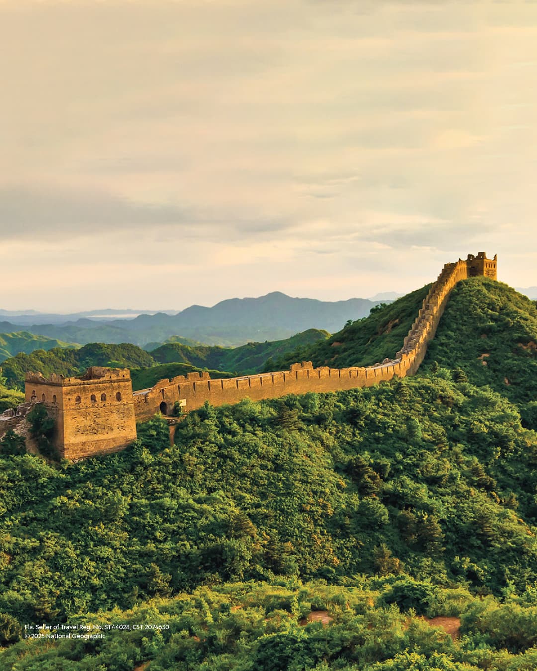 The Great Wall of China winding over green hills at golden hour