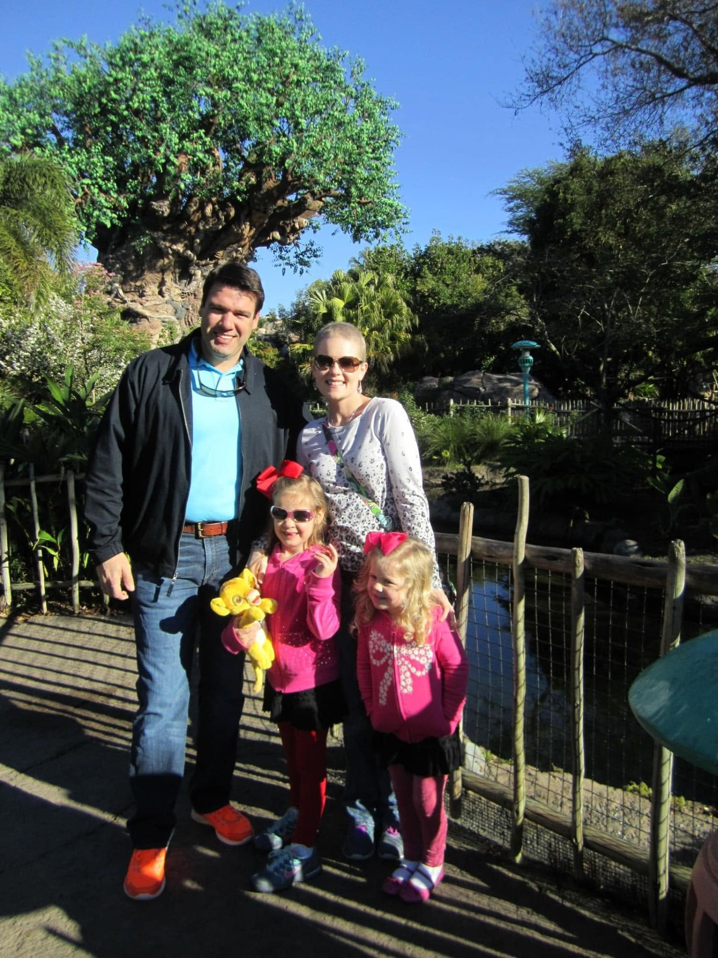The family in front of the Tree of Life on the celebration trip