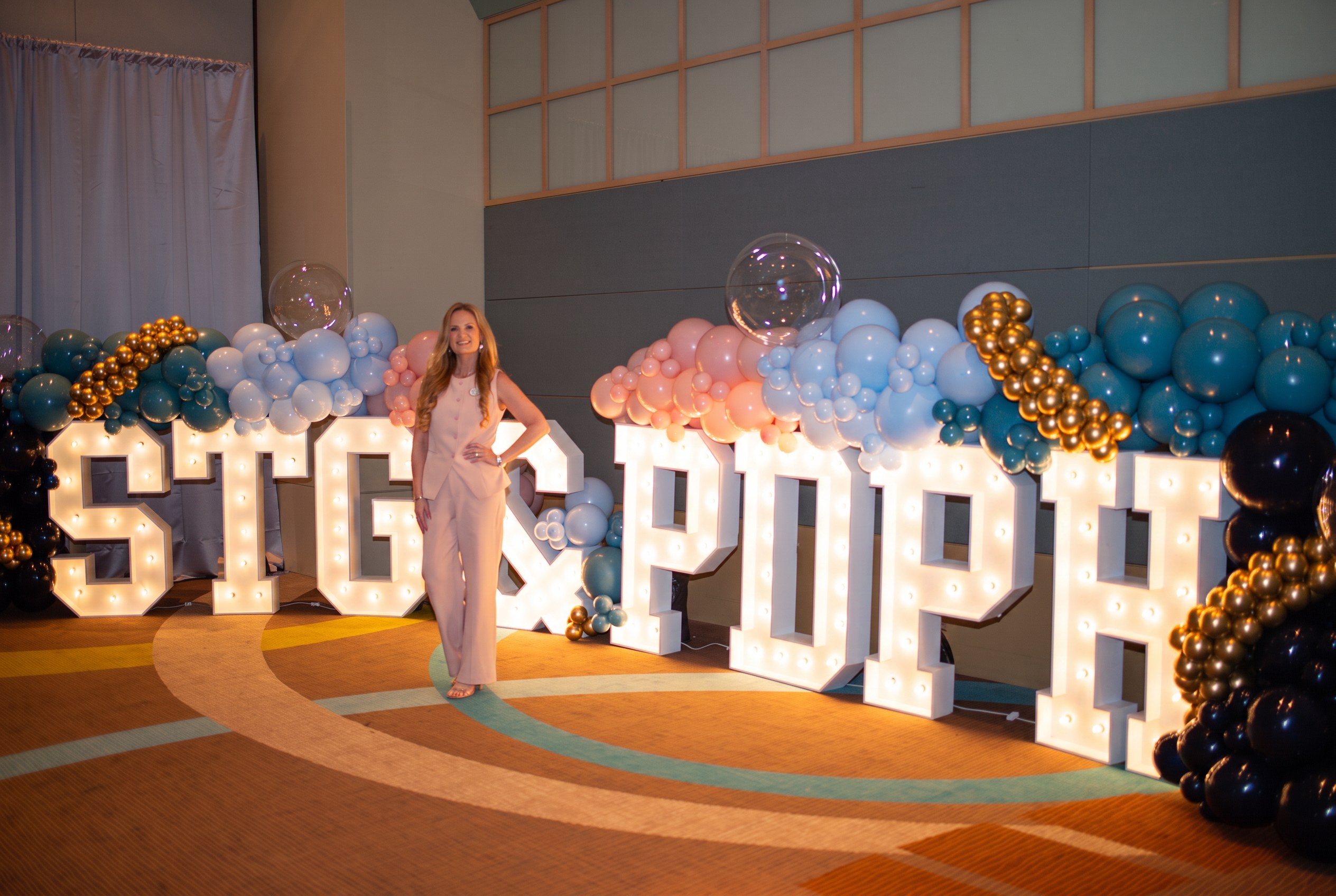 Ashlee Walker, founder, at a Pixie Dust & Pirate Hooks celebration event