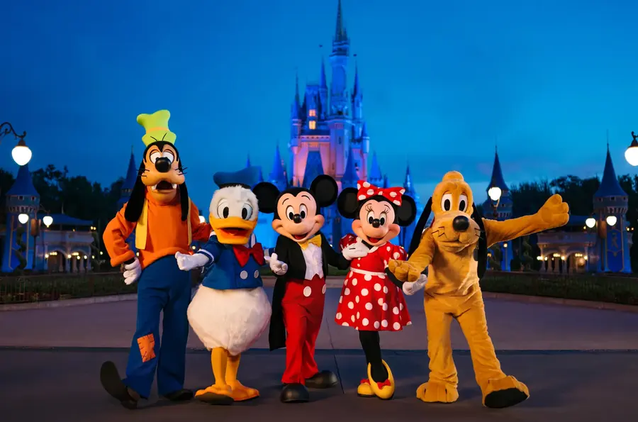 Disney characters greeting guests at the parks