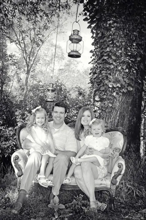 Black and white family portrait outdoors