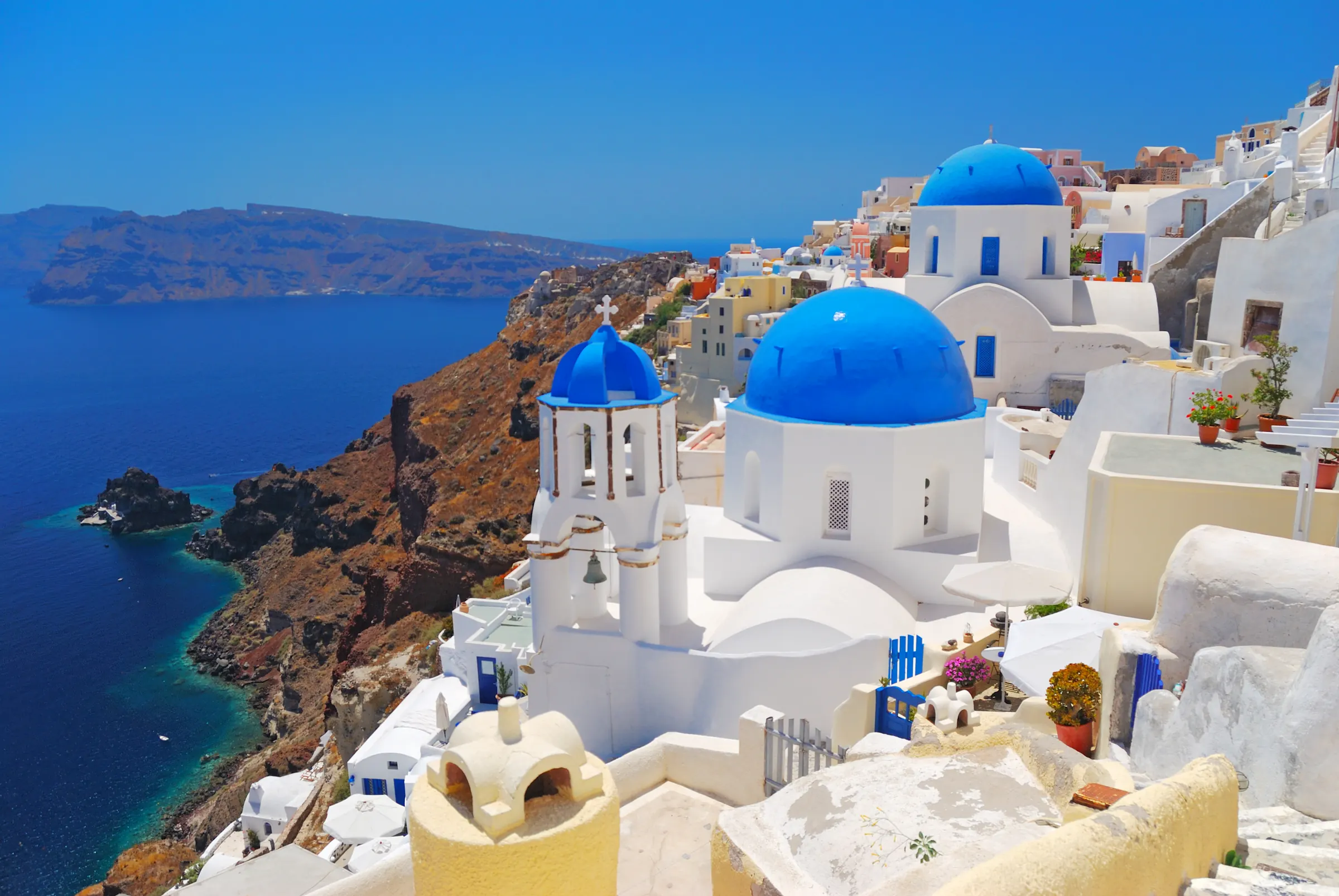 Whitewashed Santorini clifftop above the Aegean Sea